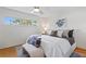 Cozy bedroom with a comfortable bed, natural light, and elegant decor at 222 Mar St, St Pete Beach, FL 33706