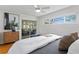 Bright bedroom with sliding door access to the sunroom and scenic outdoor views at 222 Mar St, St Pete Beach, FL 33706