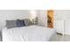 Bedroom with a view into the closet and a white dresser, offering ample storage space at 2625 State Road 590 # 2612, Clearwater, FL 33759