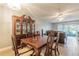 Comfortable dining area that opens to the living room and a sliding glass door leading to the patio at 2625 State Road 590 # 2612, Clearwater, FL 33759