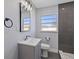 Stylish bathroom featuring vanity, modern fixtures, and a tiled shower with glass door at 2901 W Nassau St, Tampa, FL 33607