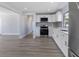 Modern kitchen with stainless steel appliances, white cabinets, and sleek countertops at 2901 W Nassau St, Tampa, FL 33607