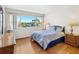 Inviting bedroom featuring water views and a calming atmosphere at 31 Island Way # 106, Clearwater Beach, FL 33767