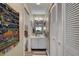 This hallway bathroom features a sink vanity, a mirror, and extra storage space at 3111 37Th S Ln # A, St Petersburg, FL 33711