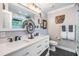 Modern bathroom with double vanity, sleek fixtures, and stylish mirror at 3206 W Lemon St, Tampa, FL 33609