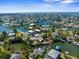 Gorgeous aerial view of canal front neighborhood with stunning waterfront homes and ocean access at 3609 Flamingo Blvd, Hernando Beach, FL 34607