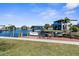 Private dock and boat lift with scenic waterway views, perfect for boating enthusiasts at 3609 Flamingo Blvd, Hernando Beach, FL 34607