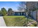 Charming single-story home featuring a well-maintained lawn and a cozy outdoor patio area at 3609 Flamingo Blvd, Hernando Beach, FL 34607