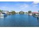 Scenic waterfront view showcasing a calm waterway surrounded by lush greenery and waterfront homes at 3609 Flamingo Blvd, Hernando Beach, FL 34607