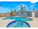 Private backyard with a sparkling pool and well-maintained fence at 3926 Indianapolis Ne St, St Petersburg, FL 33703