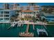 Aerial view of a waterfront property featuring a private dock and harbor access, ideal for boating and water activities at 479 E Shore Dr # 8, Clearwater, FL 33767