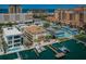 Aerial view of waterfront condos, pools and private docks at 479 E Shore Dr # 8, Clearwater, FL 33767