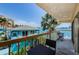 Cozy balcony featuring outdoor seating and a tranquil water view in the background at 479 E Shore Dr # 8, Clearwater, FL 33767