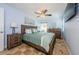 Comfortable bedroom features a bed, dresser, and a calming blue color scheme at 479 E Shore Dr # 8, Clearwater, FL 33767