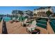 Beautiful waterfront property featuring a private dock with chairs and stunning views of the harbor at 479 E Shore Dr # 8, Clearwater, FL 33767