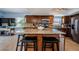 Modern kitchen featuring granite countertops, stainless steel appliances, and a breakfast bar at 479 E Shore Dr # 8, Clearwater, FL 33767
