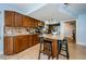 Updated kitchen features a large island with bar stool seating and stainless steel appliances at 479 E Shore Dr # 8, Clearwater, FL 33767