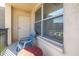 Private balcony with a chair and table, perfect for relaxing and enjoying the outside view at 5220 Brittany S Dr # 309, St Petersburg, FL 33715