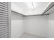 A closet with a shelf and pole for hanging clothes at 5220 Brittany S Dr # 309, St Petersburg, FL 33715