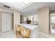 Spacious kitchen featuring a breakfast bar with seating and easy access to the living areas at 5220 Brittany S Dr # 309, St Petersburg, FL 33715