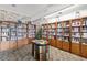 Beautiful library with an extensive collection of books, wood shelving, and reading area at 5220 Brittany S Dr # 309, St Petersburg, FL 33715
