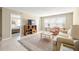 A cozy living room featuring tile flooring and neutral paint at 5220 Brittany S Dr # 309, St Petersburg, FL 33715