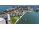 Drone view of a waterfront pool with plenty of seating and community boat docks at 5220 Brittany S Dr # 309, St Petersburg, FL 33715