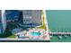 Aerial shot of outdoor community pool and docks with ocean access on the bay at 5220 Brittany S Dr # 309, St Petersburg, FL 33715