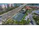 Aerial view of pristine tennis courts next to the community with parking and landscaping at 5220 Brittany S Dr # 309, St Petersburg, FL 33715