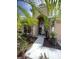 Welcoming front entrance with beautiful landscaping, complemented by a bright white walkway at 5229 Clover Mist Dr, Apollo Beach, FL 33572