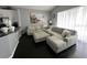 Inviting living area with comfortable seating and stylish decor, adjacent to kitchen at 5229 Clover Mist Dr, Apollo Beach, FL 33572