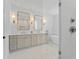 Bright bathroom with glass shower, double vanity and modern fixtures for a luxurious feel at 5337 6Th N Ave, St Petersburg, FL 33710