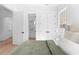 Comfortable bedroom featuring natural light, clean white trim, and light hardwood floors at 5337 6Th N Ave, St Petersburg, FL 33710