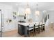 Stylish kitchen with white cabinets, a center island, and stainless steel appliances at 5337 6Th N Ave, St Petersburg, FL 33710