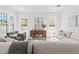Inviting living room with neutral decor, large windows, and a comfortable seating area at 5337 6Th N Ave, St Petersburg, FL 33710