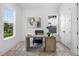Bright office with a modern desk, ample natural light, and a neutral color palette at 5337 6Th N Ave, St Petersburg, FL 33710