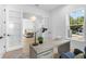 Bright office with a modern desk, ample natural light, and glass paneled doors at 5337 6Th N Ave, St Petersburg, FL 33710