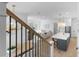 Open-concept living space with kitchen, dining area, and living room visible from the staircase at 5337 6Th N Ave, St Petersburg, FL 33710