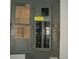 Electrical panel with breakers, wiring diagram, and inspection stickers at 780 116Th Ave, Treasure Island, FL 33706