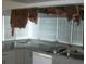 Bright kitchen with modern countertops and appliances, perfect for cooking and entertaining at 780 116Th Ave, Treasure Island, FL 33706