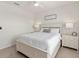 Bright bedroom featuring a comfortable bed with side tables and natural light, perfect for relaxation at 11617 Miracle Mile Dr, Riverview, FL 33578