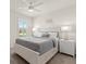 Serene main bedroom with a comfortable bed, soft lighting, and a peaceful ambiance at 11617 Miracle Mile Dr, Riverview, FL 33578