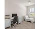 Cozy office space with a desk, comfortable chair, and chaise lounge for relaxation at 11617 Miracle Mile Dr, Riverview, FL 33578
