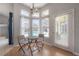 Cozy breakfast nook with views of the pool and outdoor area, illuminated by natural light at 12406 Bristol Commons Cir, Tampa, FL 33626