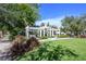 A charming community pergola with inviting swings, perfect for enjoying sunny days at 12406 Bristol Commons Cir, Tampa, FL 33626