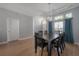 Elegant dining room featuring hardwood floors and recessed lighting at 12406 Bristol Commons Cir, Tampa, FL 33626