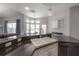 Well-appointed kitchen with granite countertops, a double basin sink, and pendant lighting fixtures at 12406 Bristol Commons Cir, Tampa, FL 33626