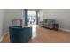 Comfortable living room area with hardwood floors and natural light at 12406 Bristol Commons Cir, Tampa, FL 33626