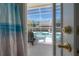 Inviting screened-in pool area with patio furniture, perfect for relaxing and enjoying outdoor living at 12406 Bristol Commons Cir, Tampa, FL 33626