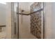 Shower boasts stylish tilework with glass enclosure, adding a touch of luxury to the bathroom at 12406 Bristol Commons Cir, Tampa, FL 33626